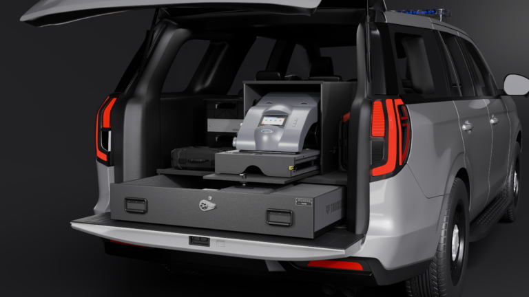 Render of the ST7a Intox System by TruckVault installed in the rear of an SUV. An Intoxilyzer is on the glide and the lower drawer is open.