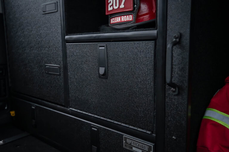 Compression latch as it appears on a TruckVault system