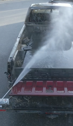TruckVault truck bed being water tested for durability.